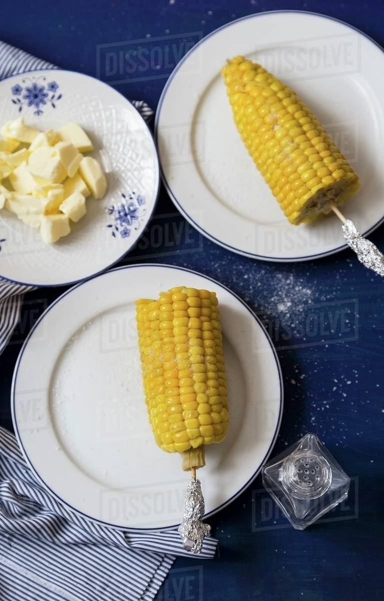 Cornonthecob with butter Stock Photo Dissolve