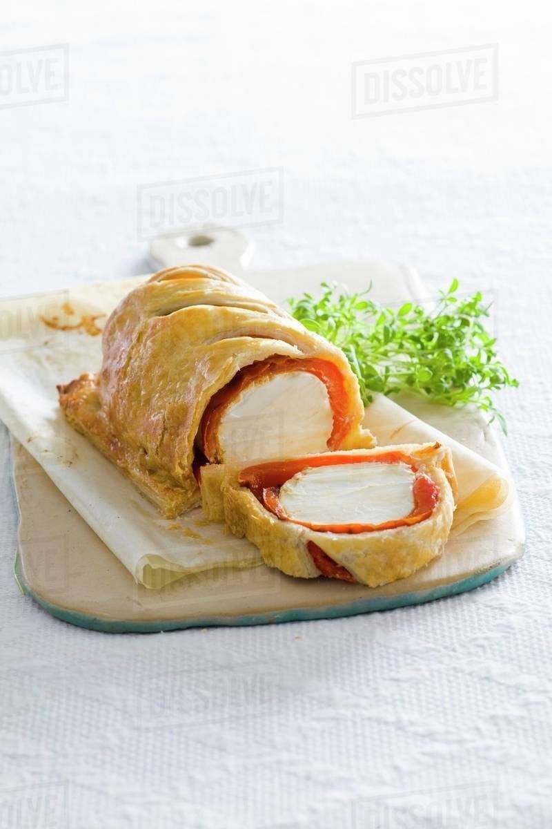 Goat's cheese wrapped in puff pastry Stock Photo Dissolve