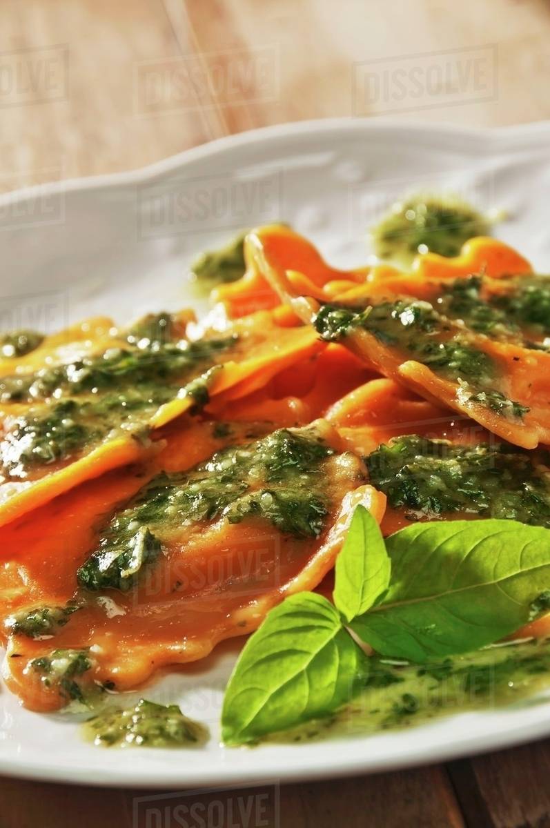 Lobster Ravioli with Homemade Pesto Sauce Stock Photo Dissolve