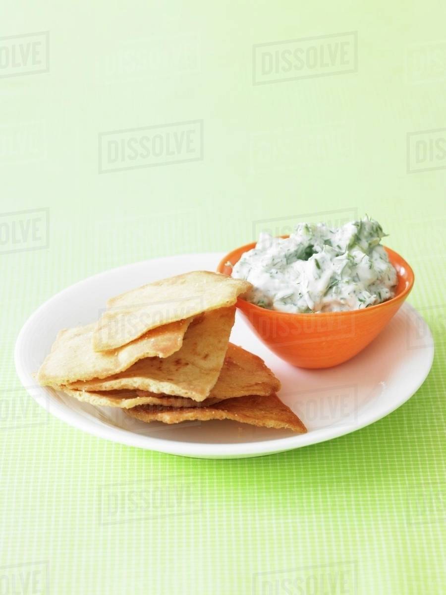 Savory Yogurt Dip with Toasted Pita Bread Stock Photo Dissolve