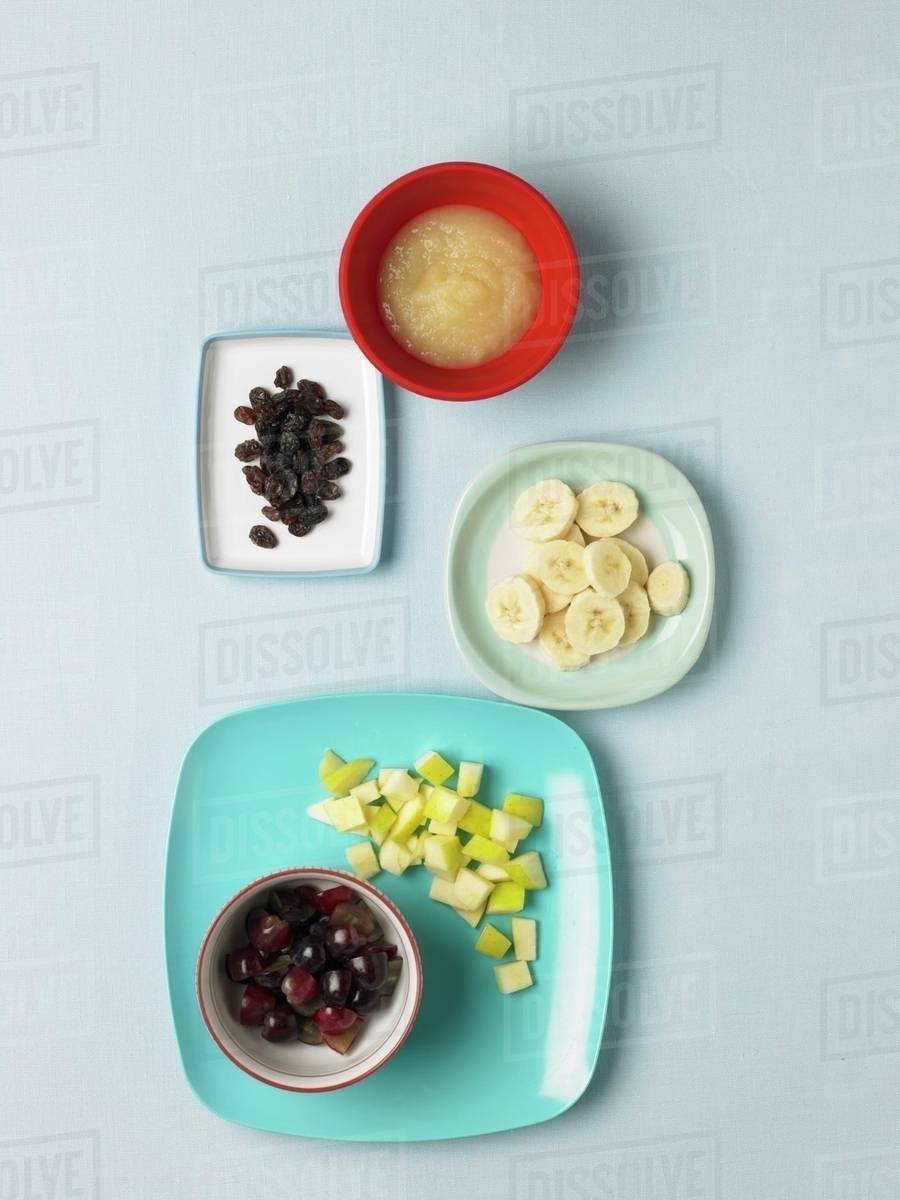 Assorted Fruit and Applesauce Stock Photo Dissolve