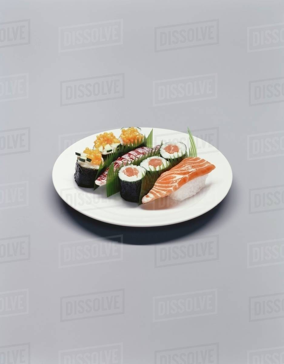 Various types of sushi on a plate Stock Photo Dissolve