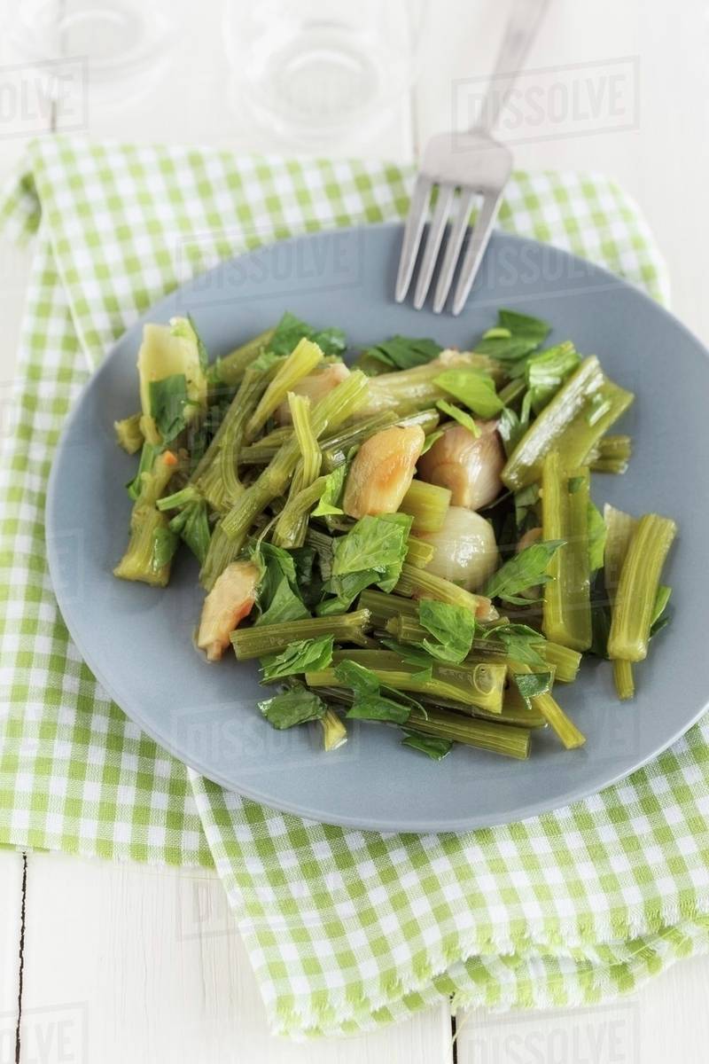 Cooked celery with onions Stock Photo Dissolve