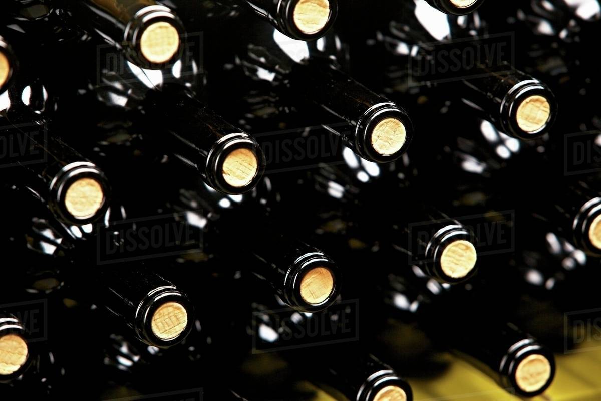 A stack of wine bottles Stock Photo Dissolve