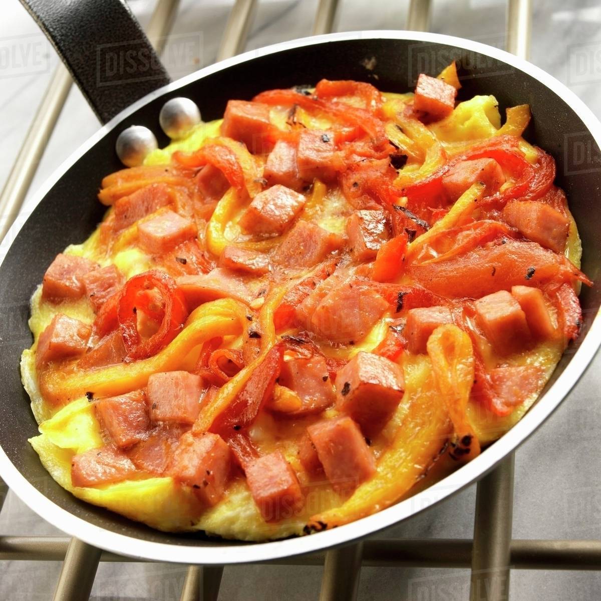 Piperrada (Basque Pepper Omelet) in a Skillet Stock Photo Dissolve