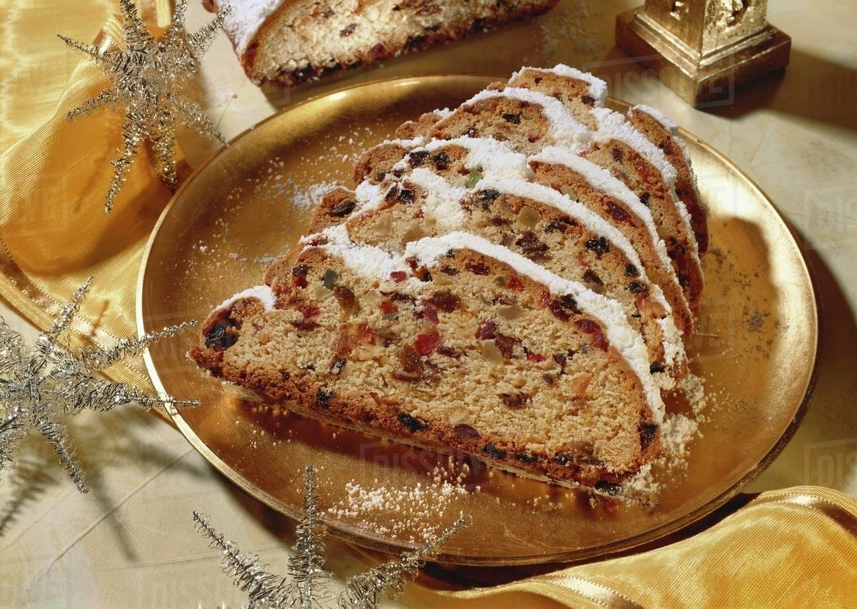 Butter stollen with almonds and candied fruit Stock Photo Dissolve