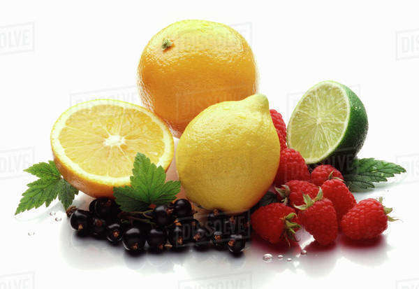 Citrus fruits, redcurrants and raspberries - Royalty-free Stock Photo ...