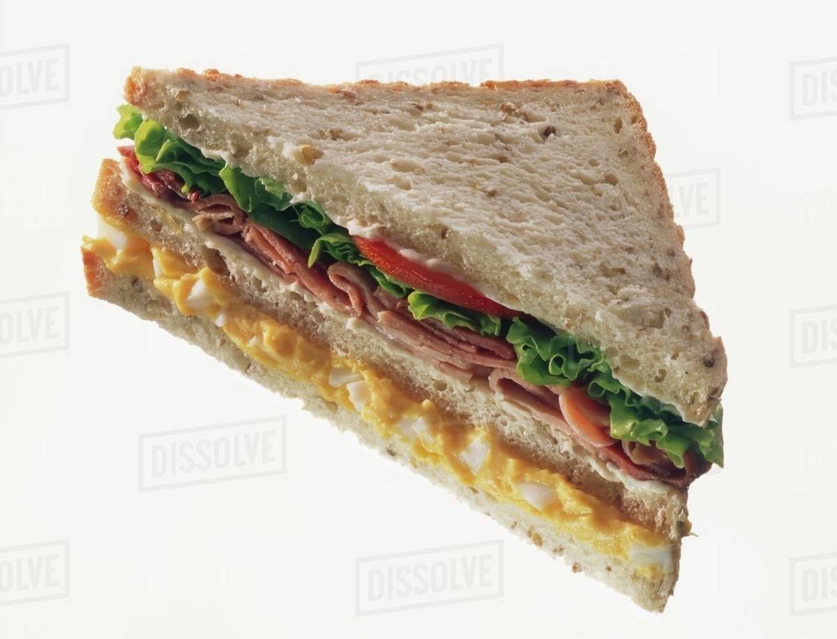 Doubledecker egg, ham & lettuce sandwich in granary bread Stock