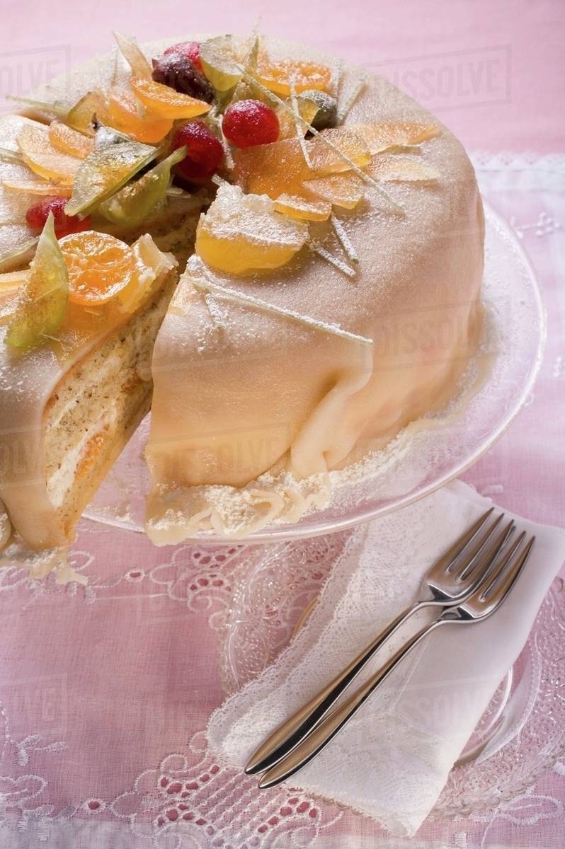 Marzipancovered cake with candied fruit Stock Photo Dissolve