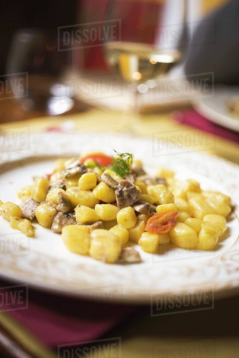Gnocchi with anchovies Stock Photo Dissolve