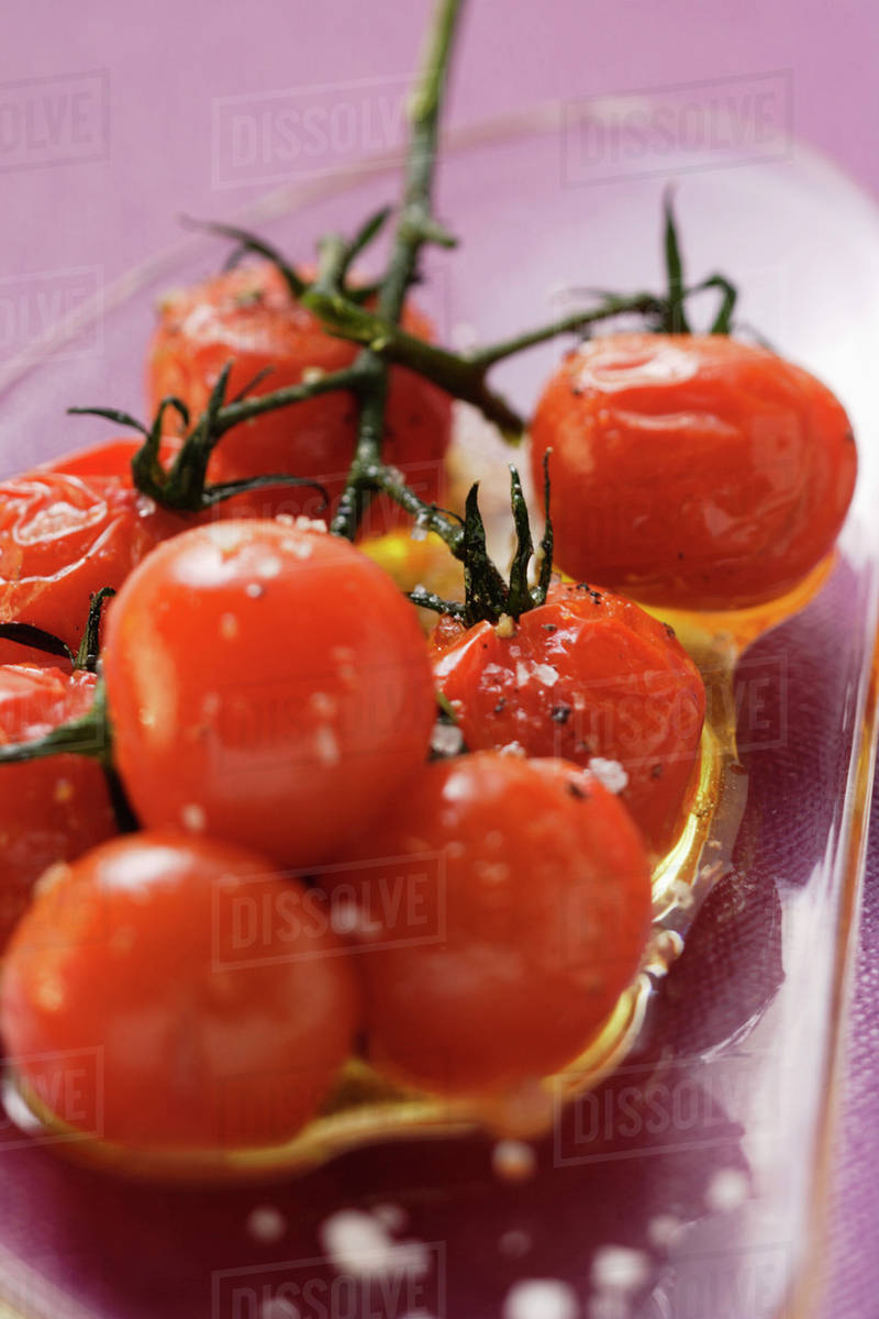 Stewed cherry tomatoes Stock Photo Dissolve