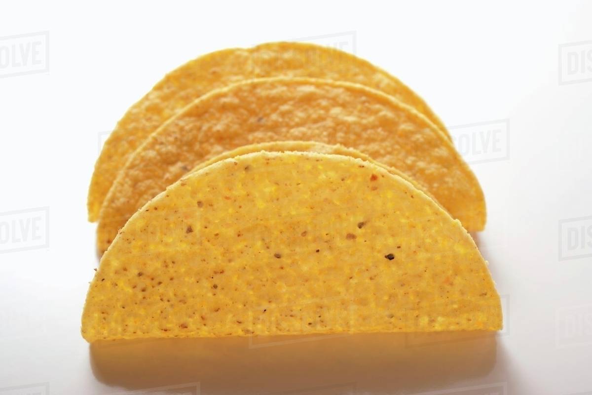Taco shells on white background - Stock Photo - Dissolve