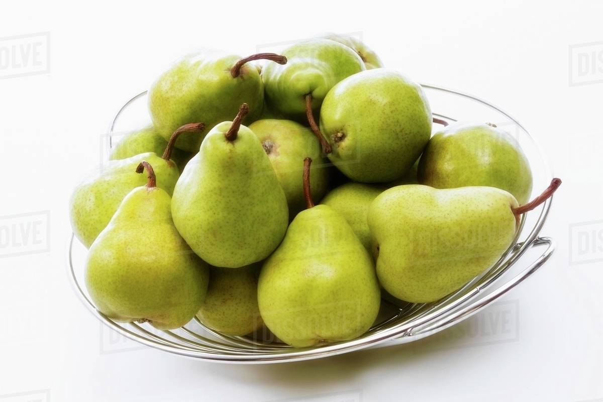 Green Pears In A Fruit Bowl Stock Photo Dissolve Green Pears In A Fruit Bowl