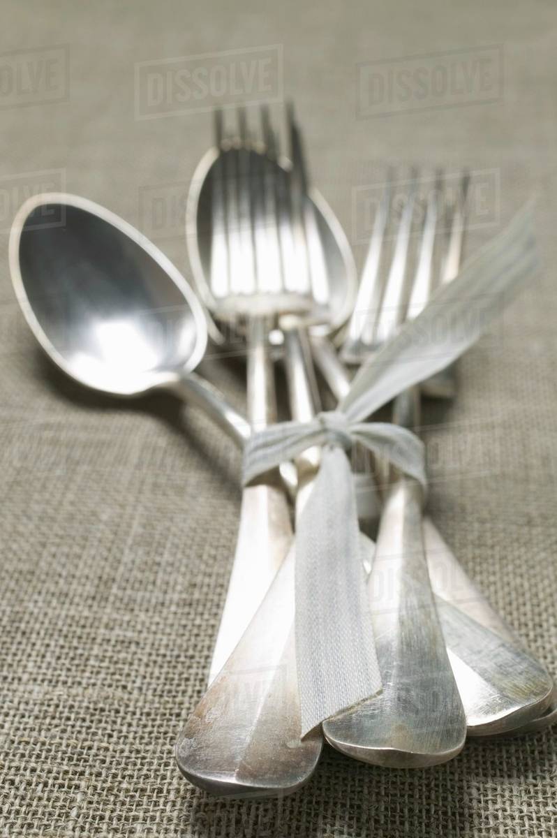 Forks and spoons Stock Photo Dissolve