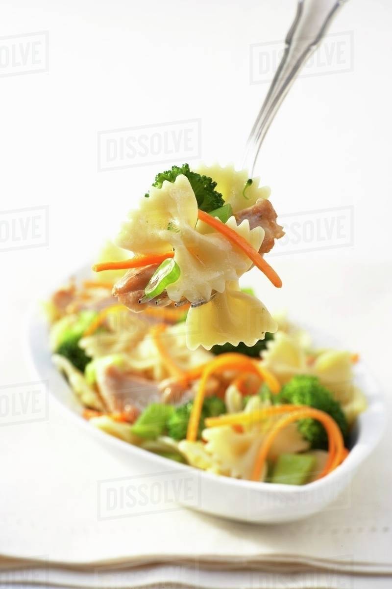 Farfalle primavera with chicken Stock Photo Dissolve
