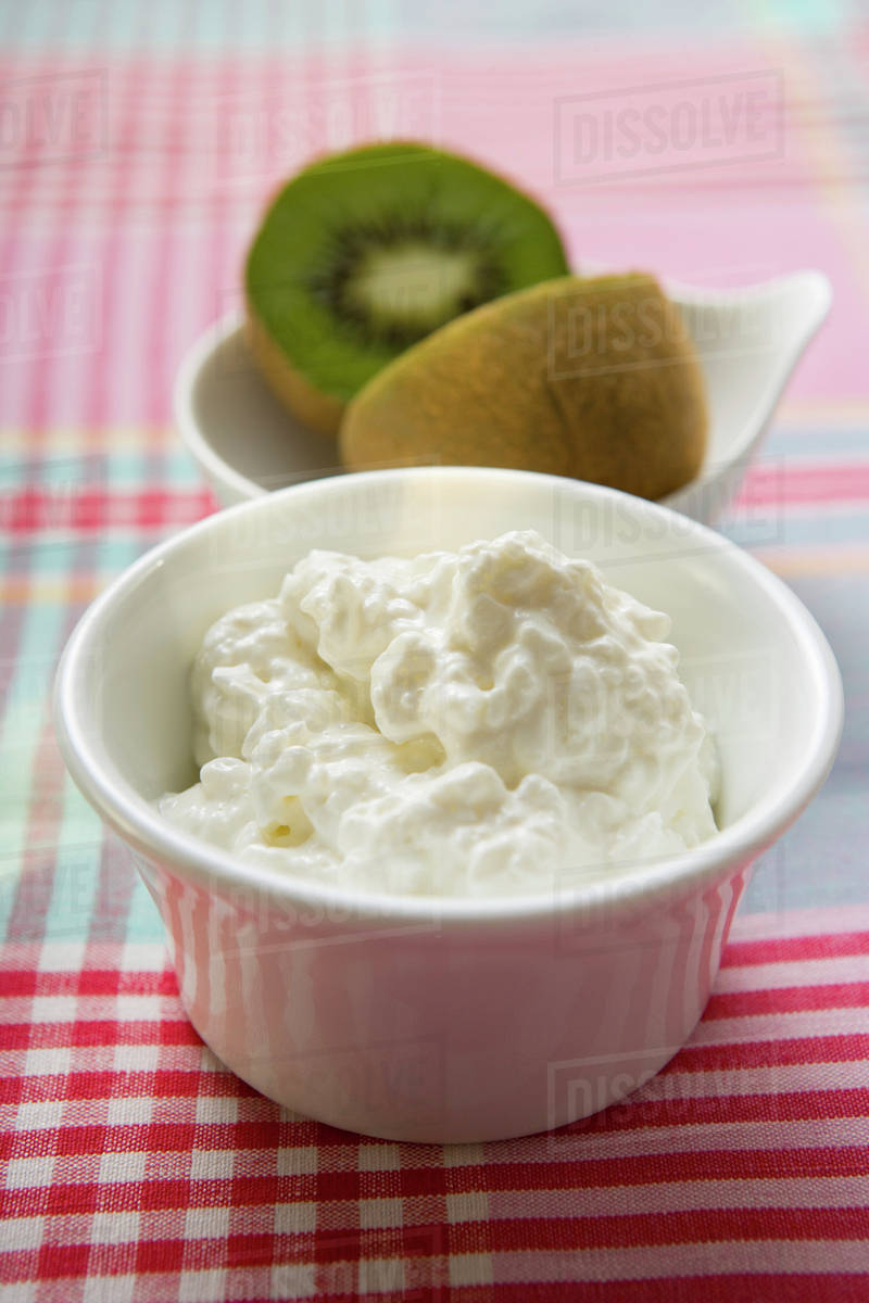 Cottage Cheese In A Small Bowl Kiwi Fruit Behind Stock Photo