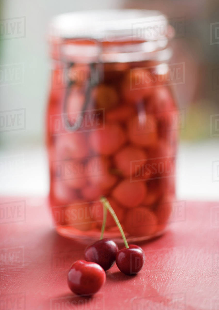 Preserved cherries Stock Photo Dissolve