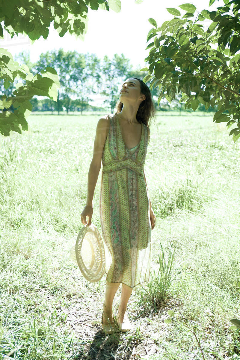 Young woman wearing sundress and 