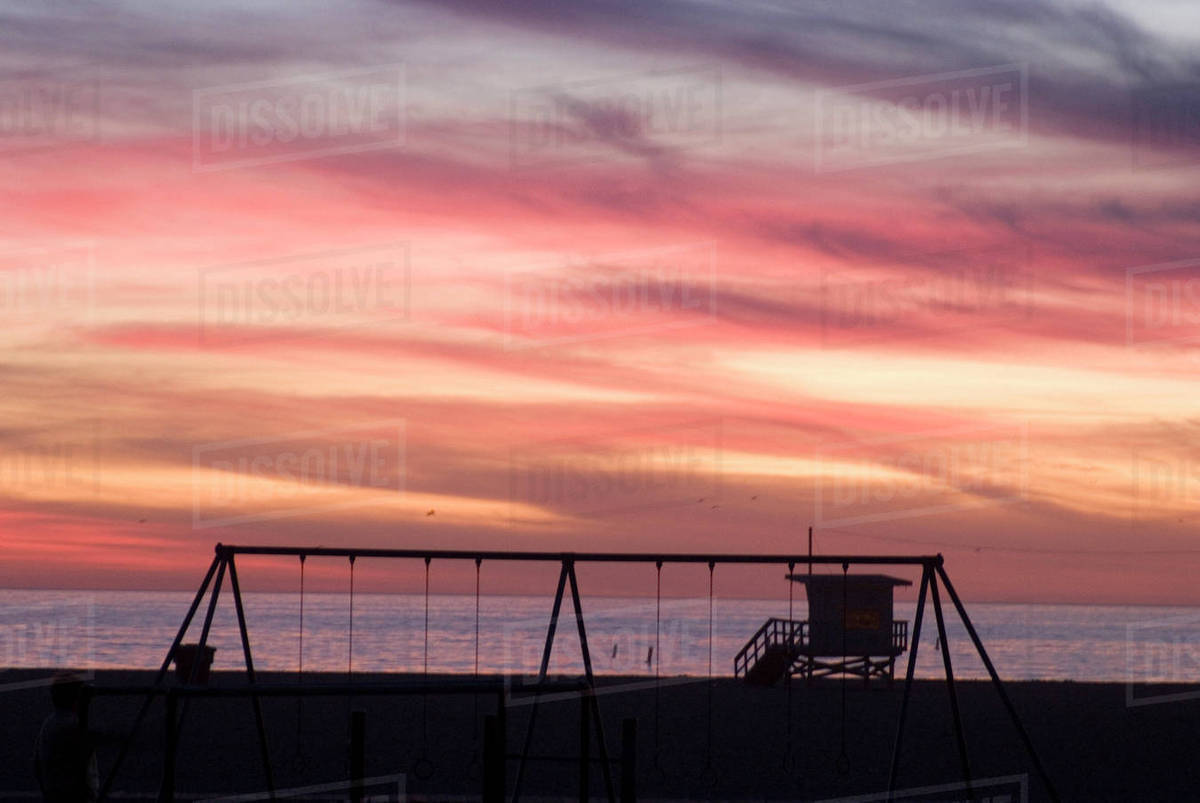 Backlit Swings At Sunset Santa Monica Beach Stock Photo Dissolve Backlit Swings At Sunset Santa Monica Beach