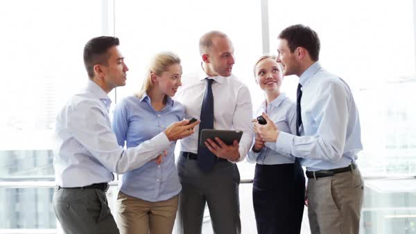 Business Team With Laptop Computer Papers And Smartphone Meeting In Business Team With Tablet And Smartphones Meeting In Office Royalty Free Stock Video