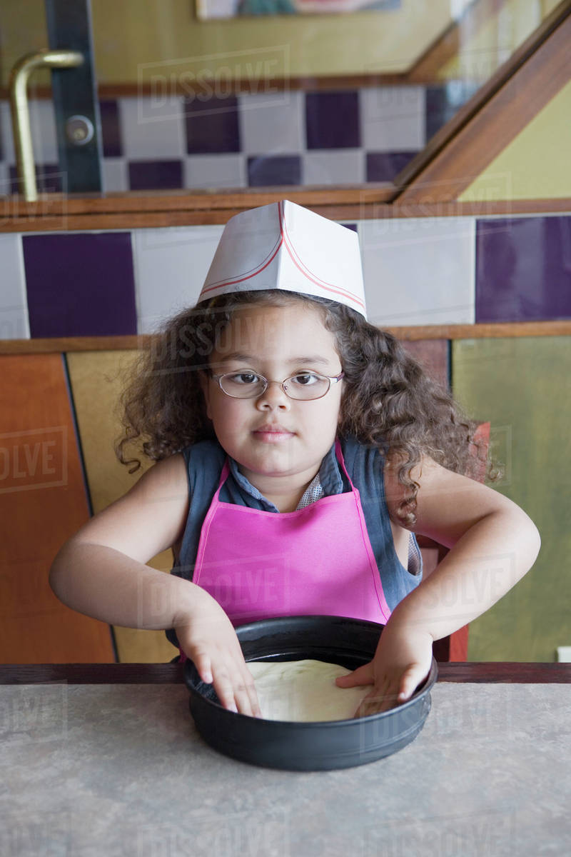 hispanic-girl-baking-stock-photo-dissolve