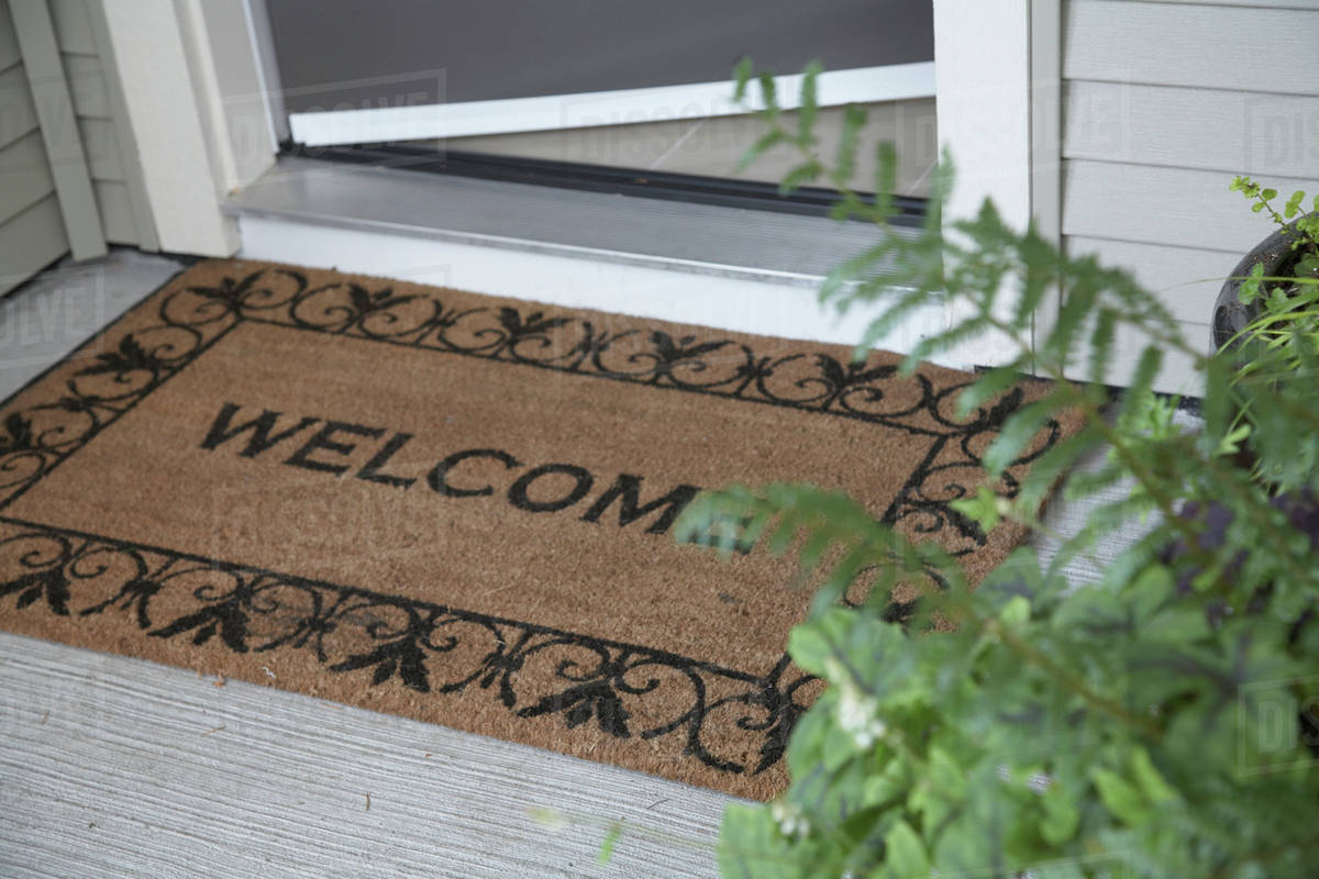 open door welcome mat stock open door and welcome doormat stock photo dissolve open door welcome mat stock open door and welcome doormat stock photo dissolve