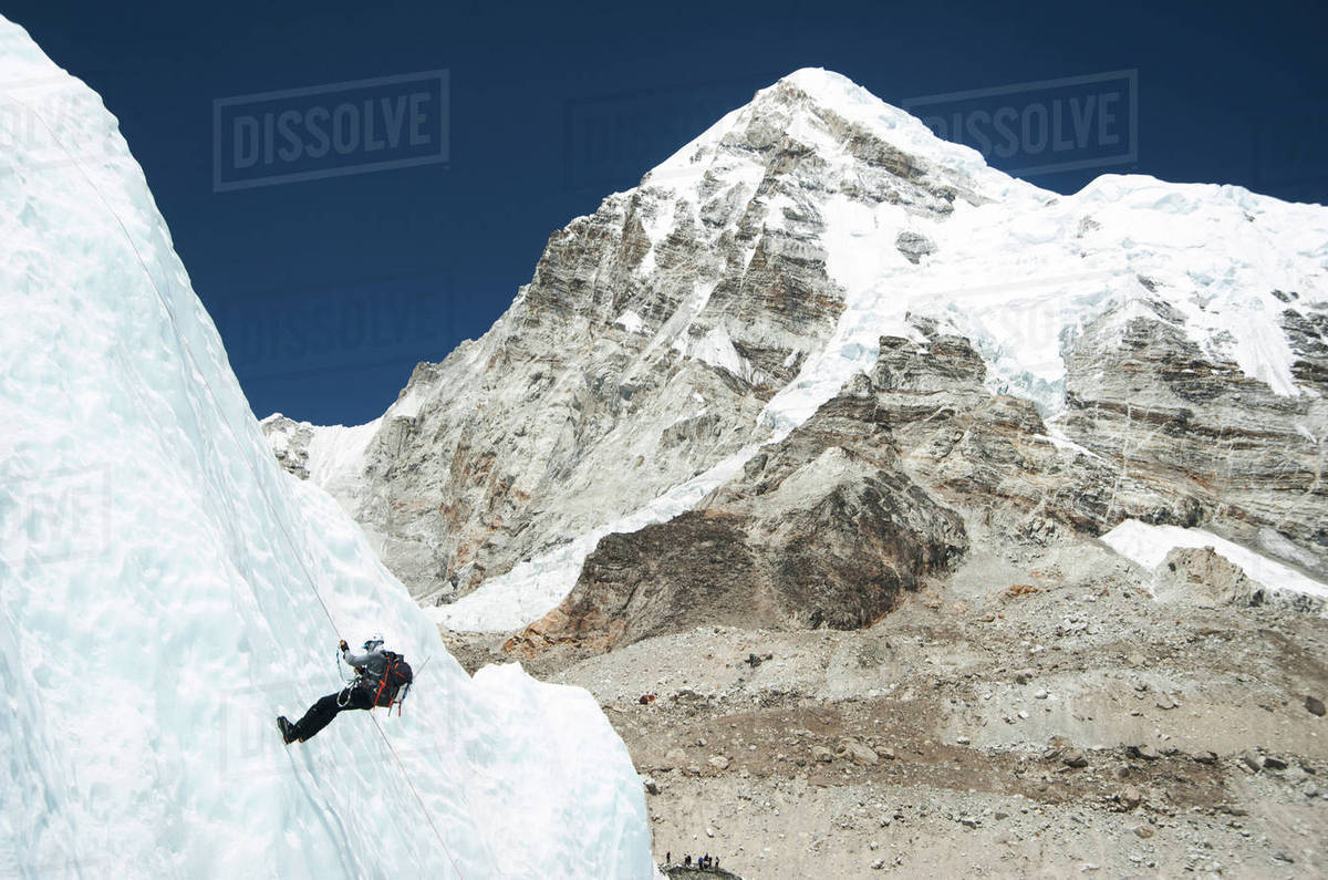 Climber using rope on mountain, Everest, Khumbu region, Nepal - Royalty ...
