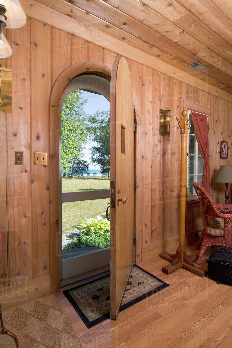 Interior View Of Front Door Looking Outside In Cabin Style Home Interior View Of Front Door Looking Outside In Cabin Style Home