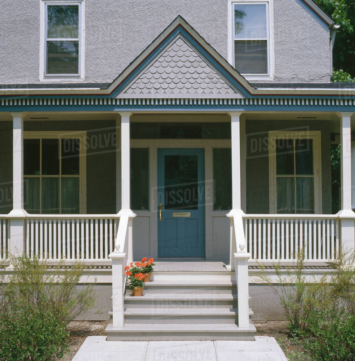 Front Porch Of Gray Stucco House With Dark Blue Trim Stock Photo Front Porch Of Gray Stucco House With Dark Blue Trim