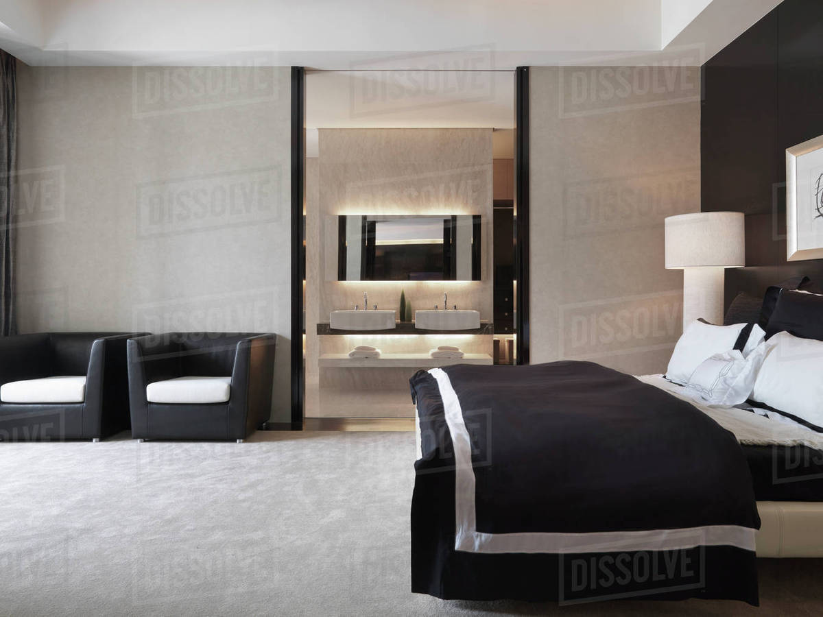 Black and white modern master bedroom Stock Photo Dissolve