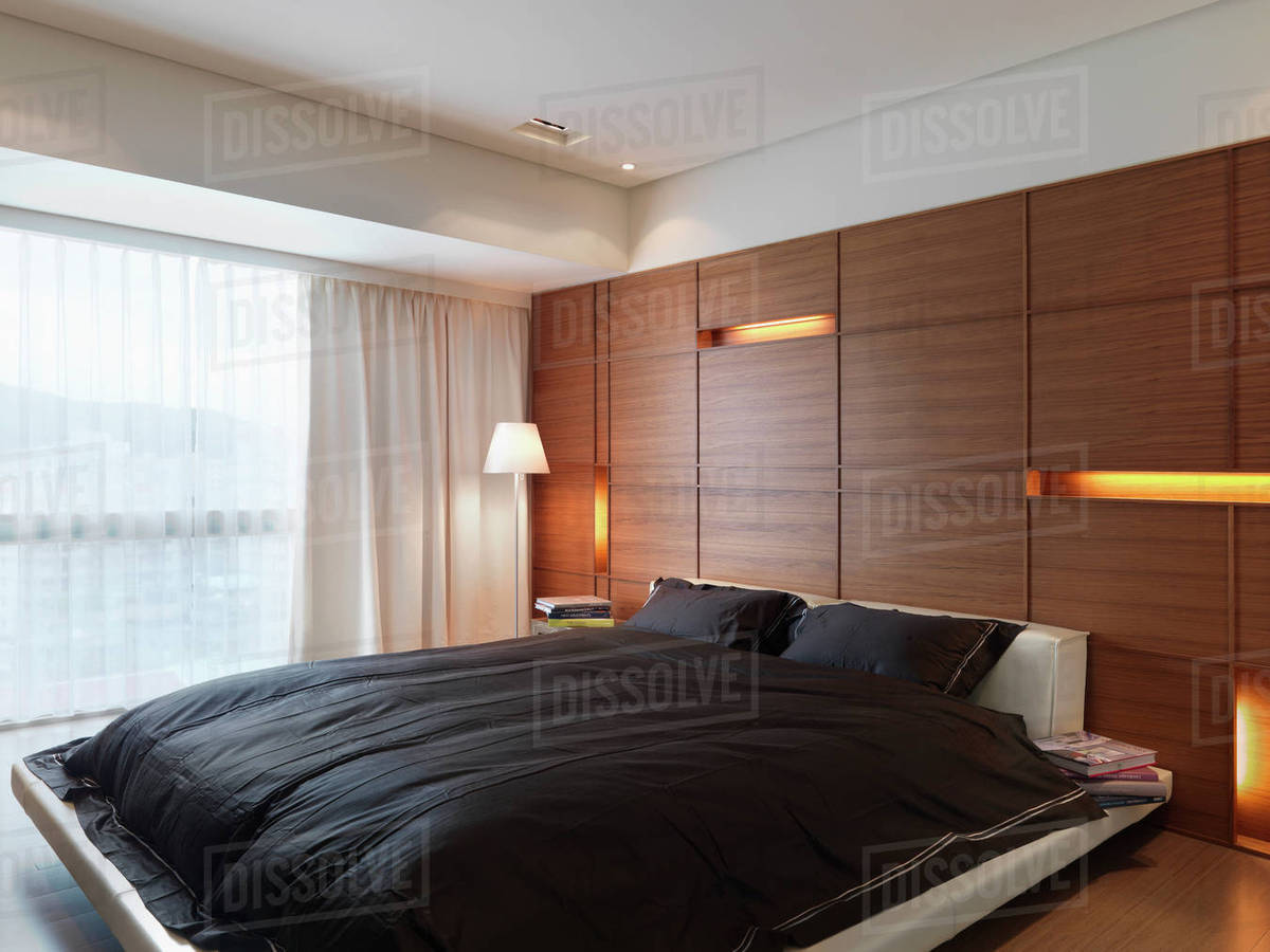 Black and white modern bedroom with platform bed Stock Photo Dissolve
