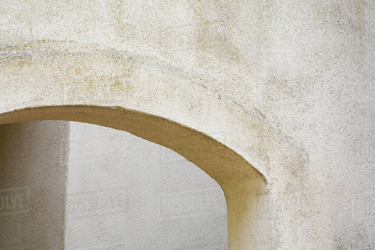 Arched Exterior Stucco Doorway - Stock Photo - Dissolve