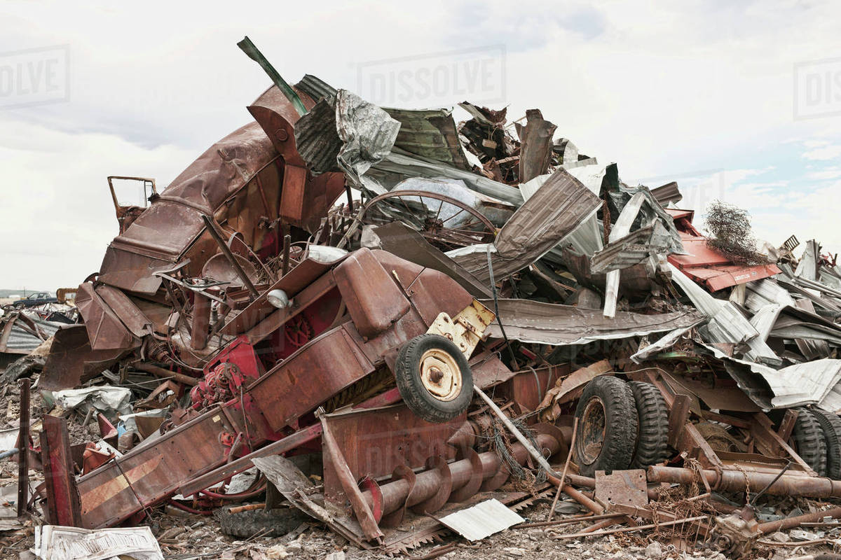 Stacked car parts in junkyard Stock Photo Dissolve