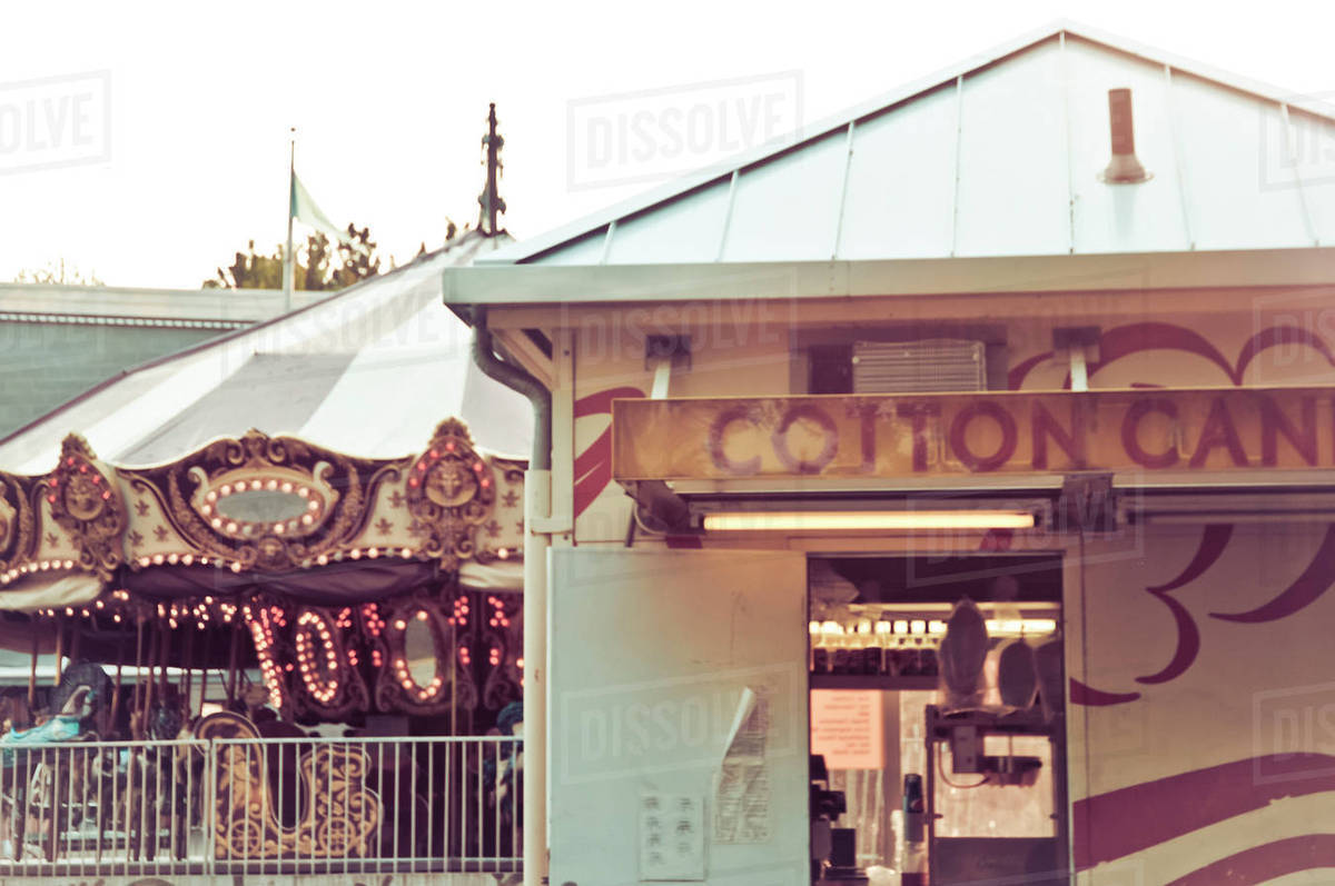Cotton candy stall at amusement park Stock Photo Dissolve