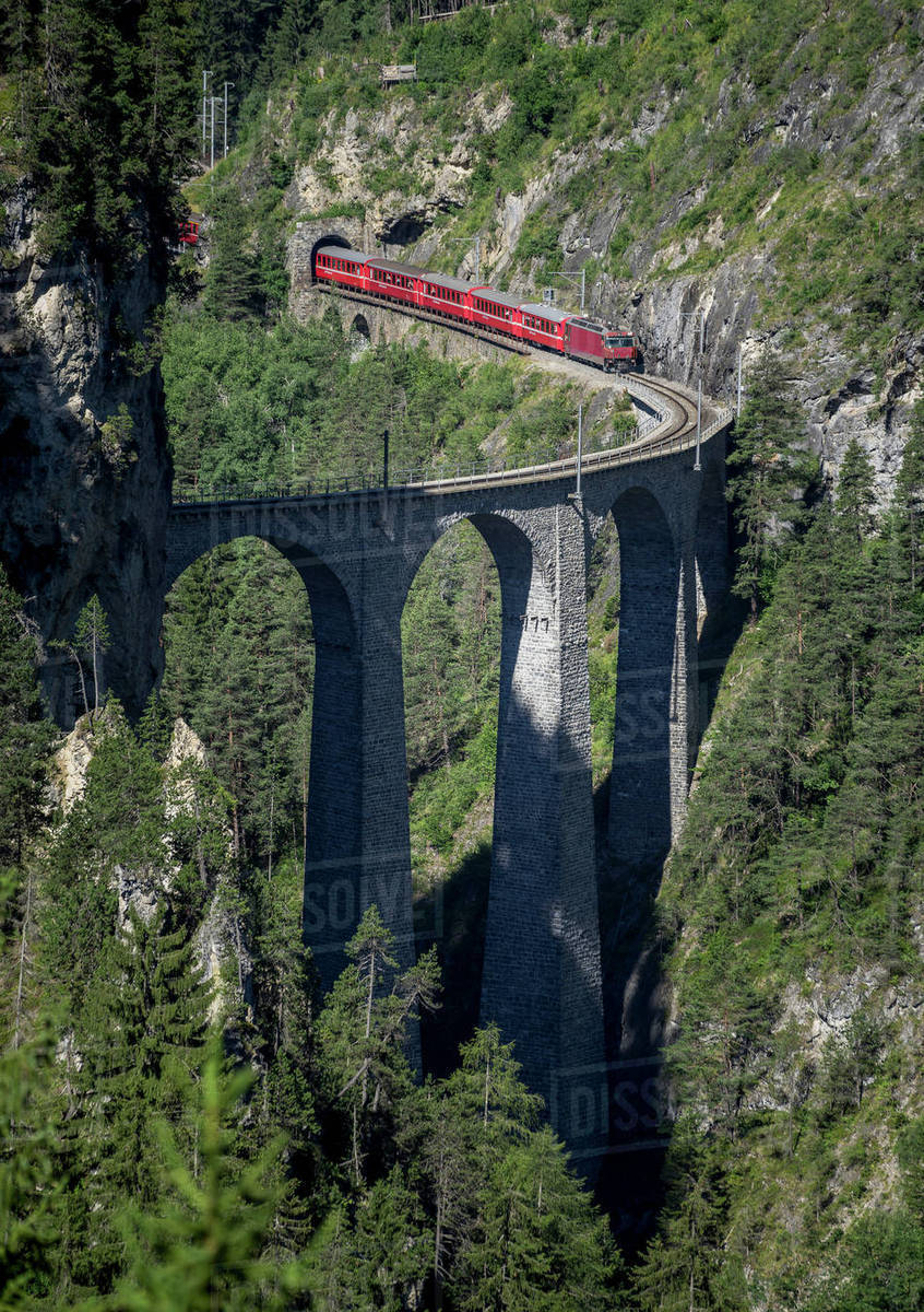 Train on mountain bridge, Filisur, Canton Graubunden, Switzerland