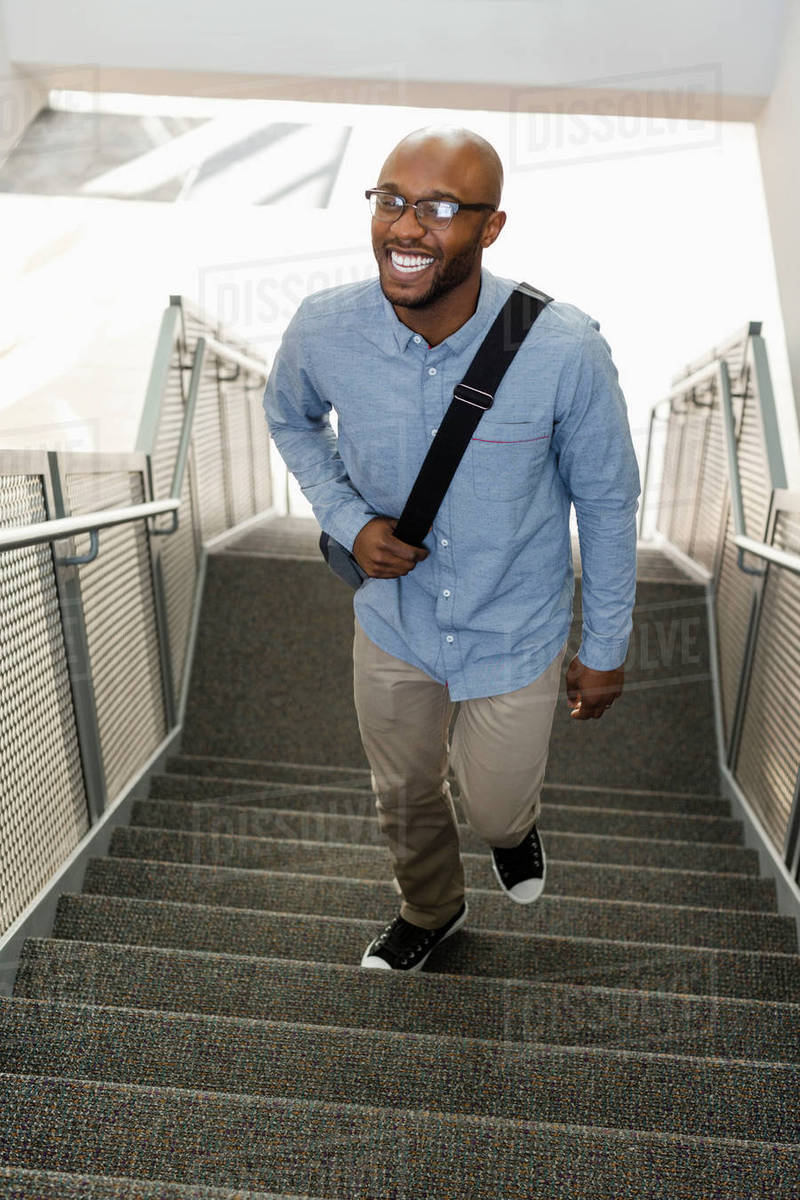 Man Climbing Stairs African American Man Climbing Staircase