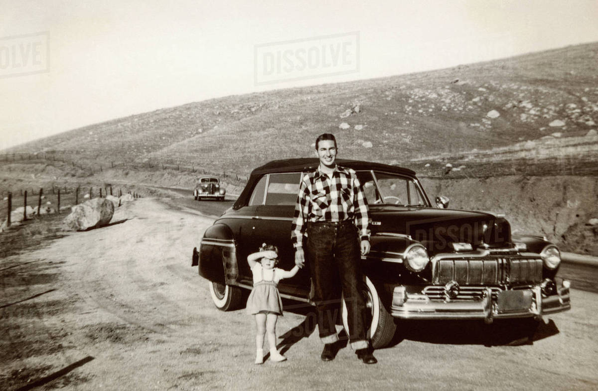 Portrait Of Caucasian Father And Daughter Posing Near Vintage Car Stock Photo Dissolve
