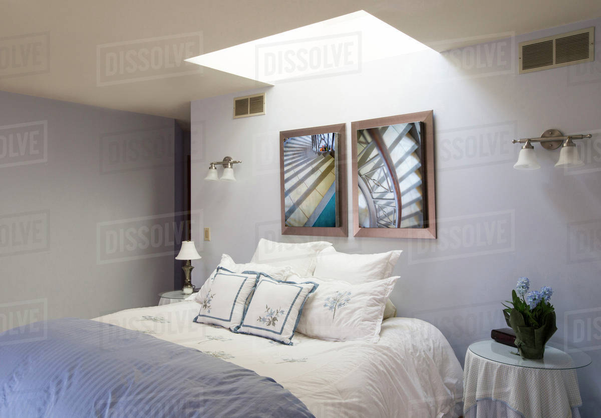 Skylight over bed Stock Photo Dissolve