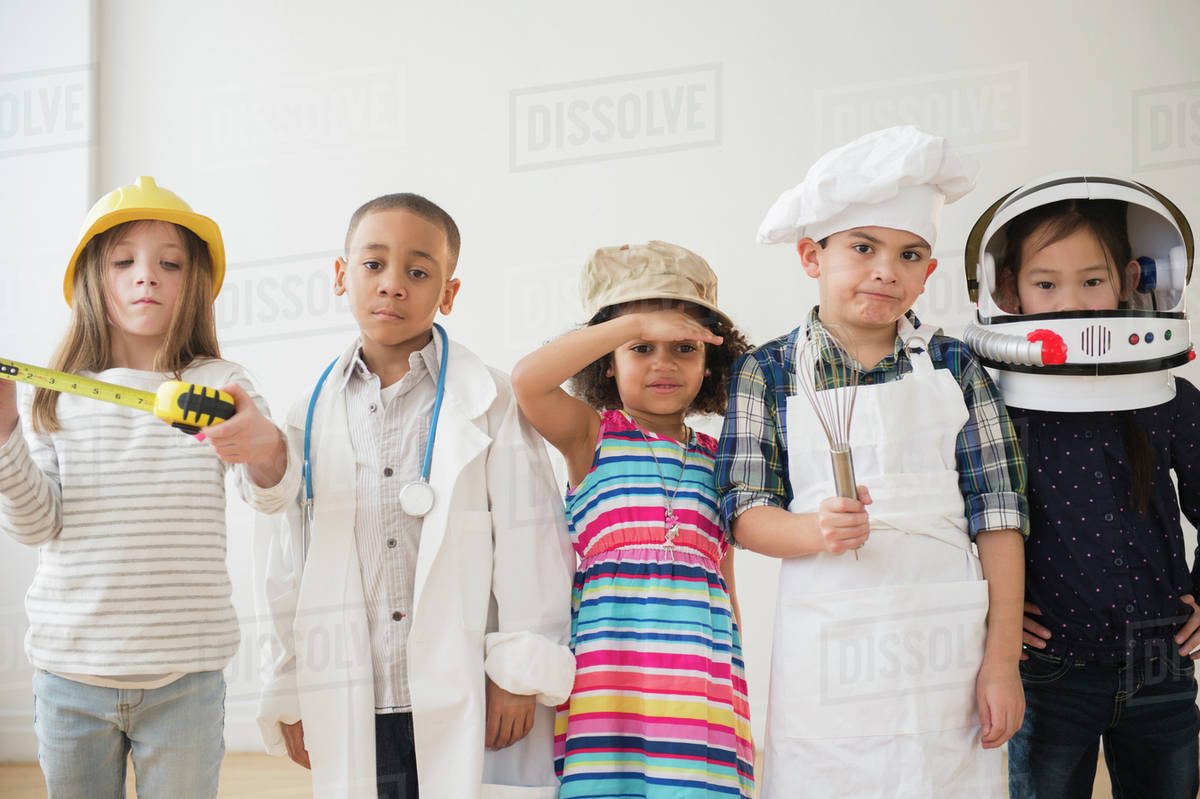 Children playing dress up together Stock Photo Dissolve