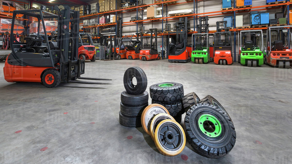 Forklift tires in warehouse Stock Photo Dissolve