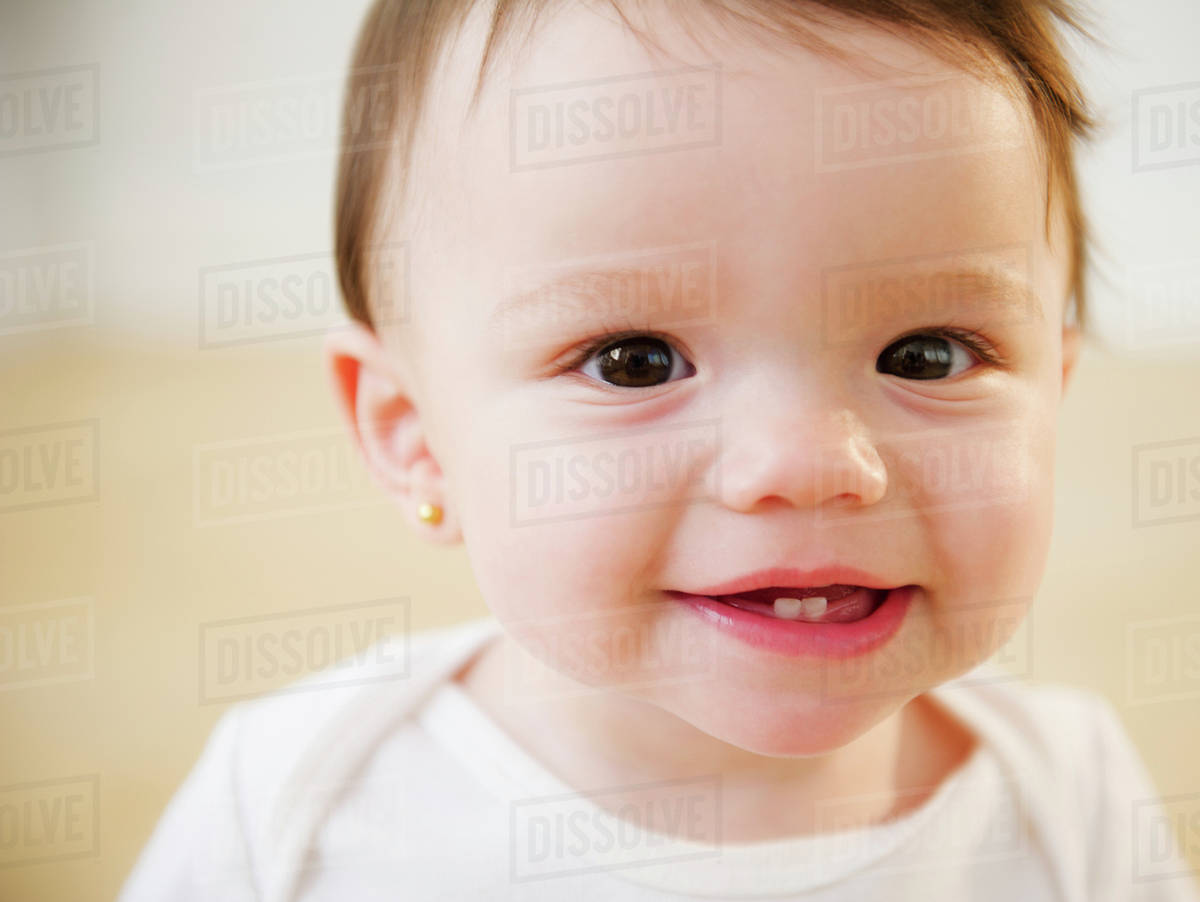 Mixed race baby smiling Stock Photo Dissolve