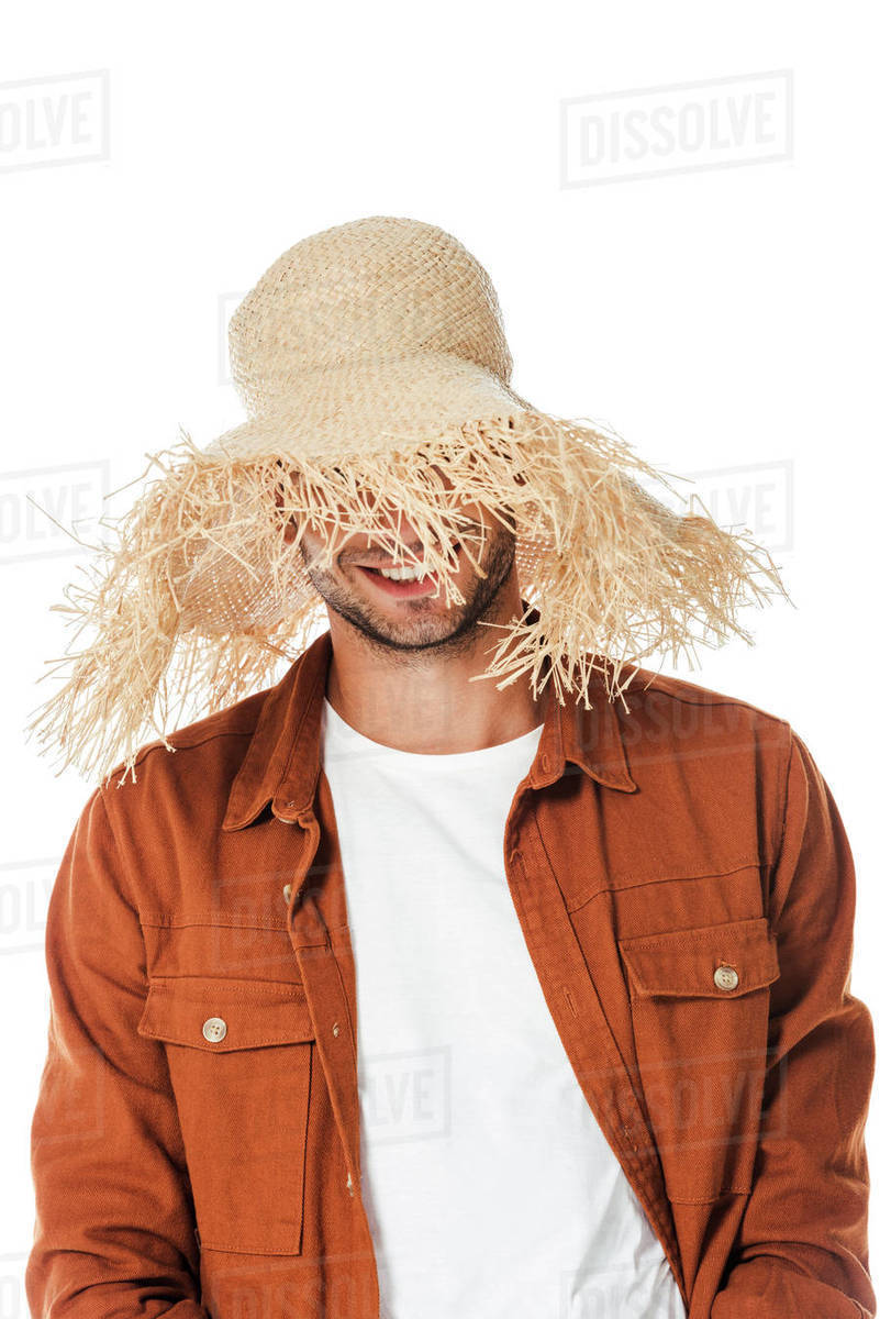 Portrait of smiling man in straw hat isolated on white Stock Photo Dissolve