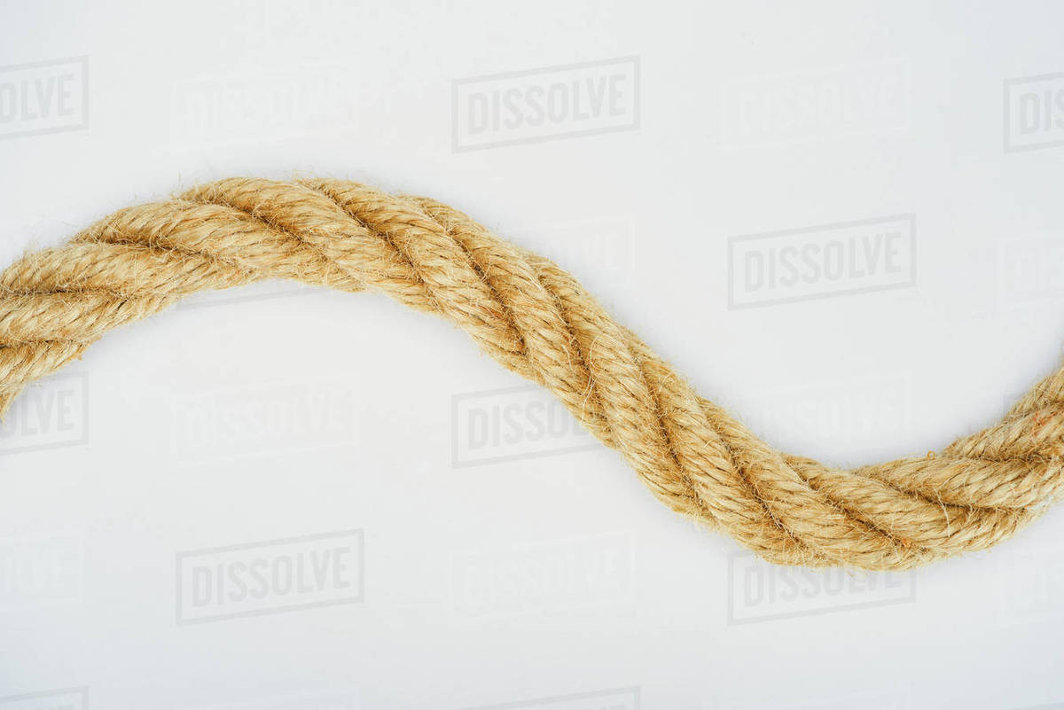 Elevated view of nautical rope isolated on white Stock Photo Dissolve