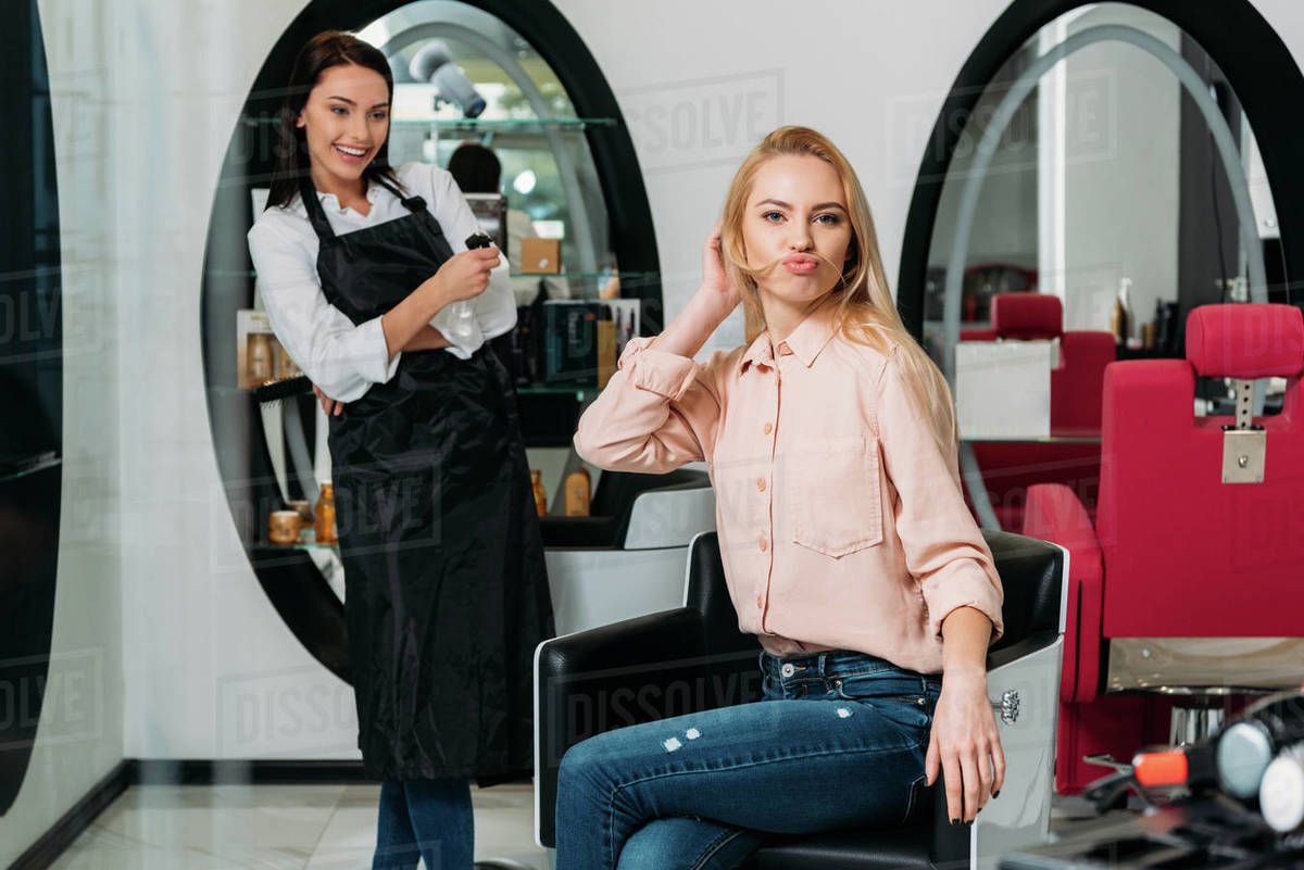 Customer making mustache of hair at salon Stock Photo Dissolve