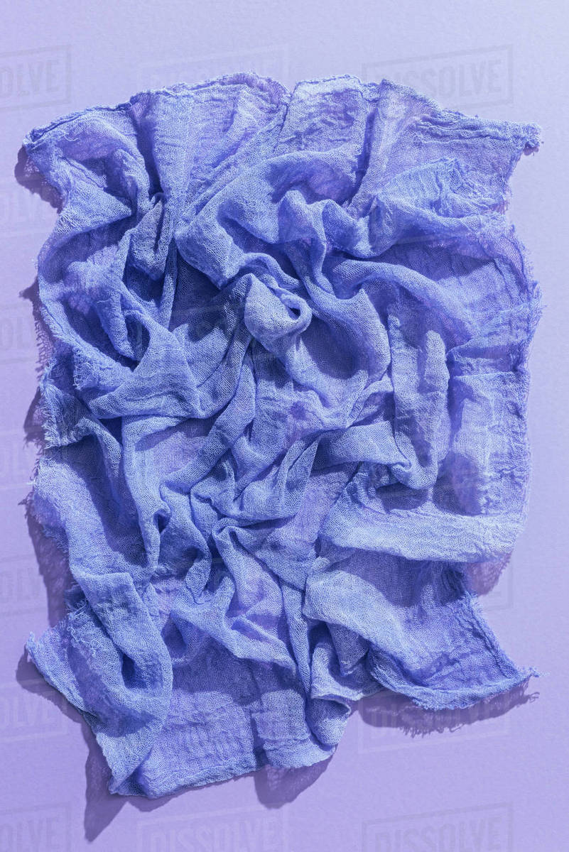 Top view of purple gauze fabric on purple background tissue Stock