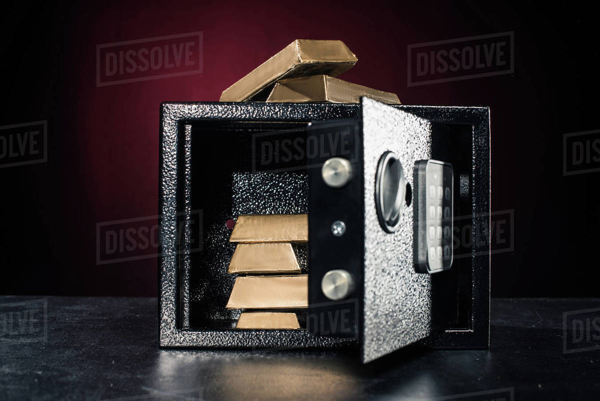 gold-bars-stacked-in-open-safe-stock-photo-dissolve