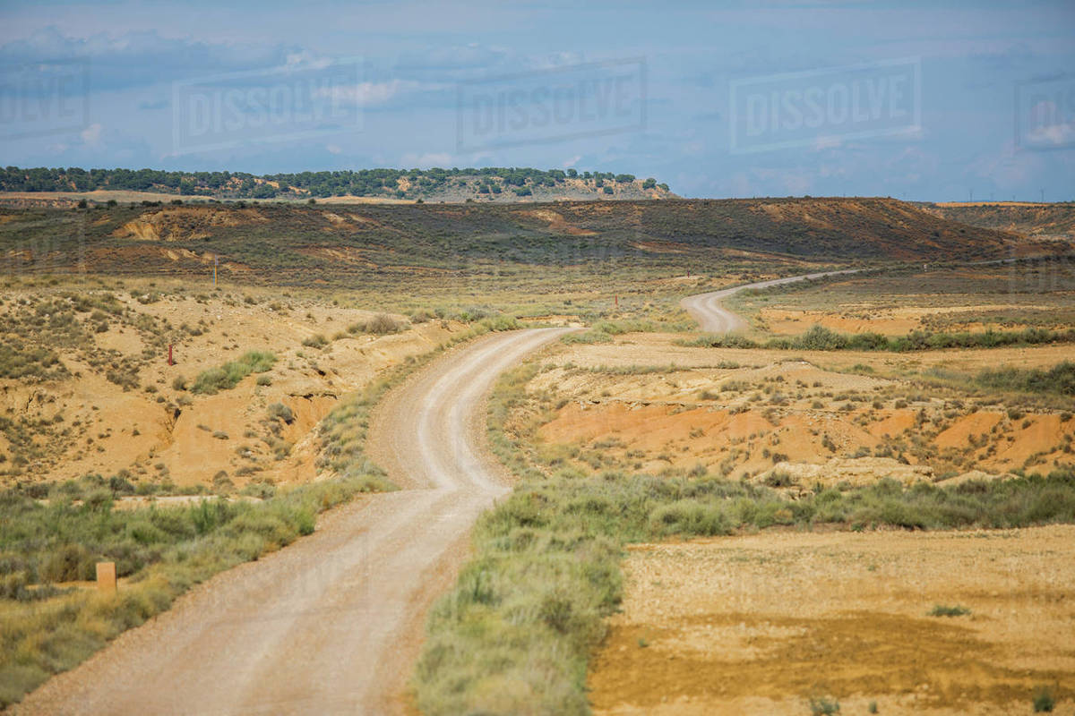 Spain, Dirt road Stock Photo Dissolve