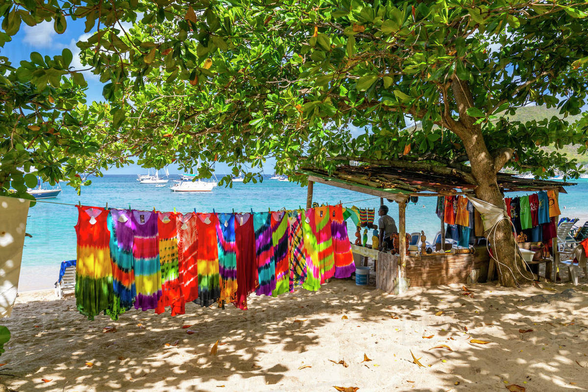 Colourful garments at Port Elizabeth, Admiralty Bay, Bequia, The Grenadines, St. Vincent and the Grenadines, Windward Islands, West Indies, Caribbean, Central America Royalty-free stock photo