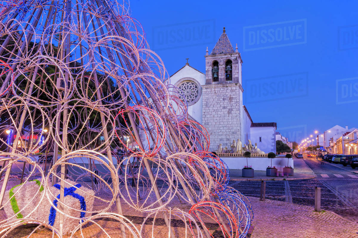 Illuminated modern Christmas tree in front of the Parish Church, Alcochete, Setubal Province, Portugal, Europe Royalty-free stock photo