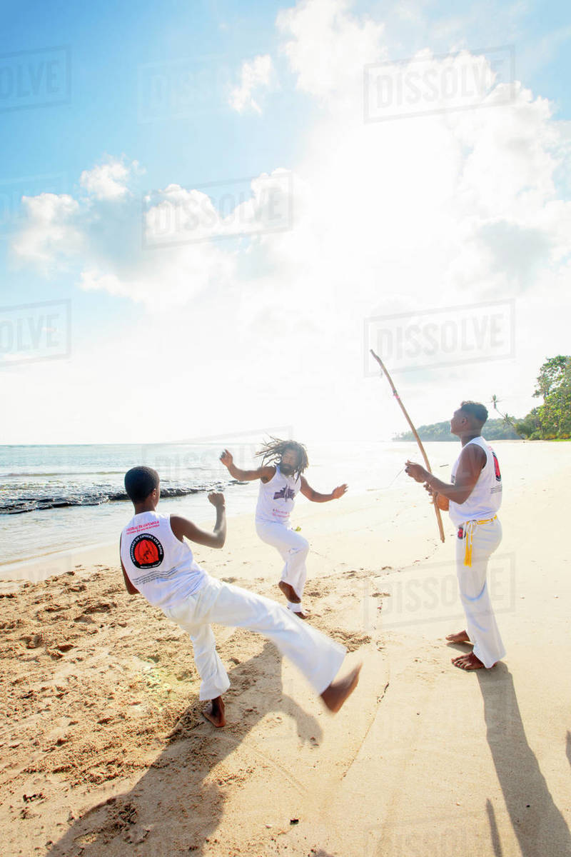 Local people playing capoeira on the beach, Boipeba Island, Tinhare, Brazil, South America Royalty-free stock photo